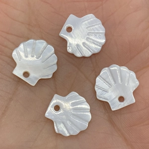 Set of four natural freshwater shell scallop pendants with iridescent pearl luster for DIY