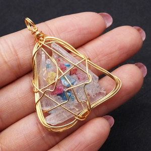 Handmade gold wire-wrapped triangle pendant with white crystals and colorful gemstones