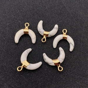 Set of five crescent stone pendants with white marble texture and gold plated metal trim