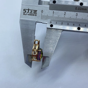Detailed measurement of faceted natural stone pendant with caliper showing 8mm width