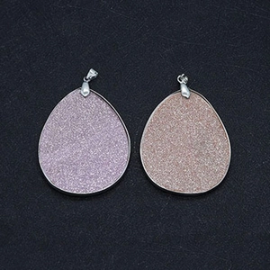 Pink and purple shell pendant with matte glitter finish and drop-shaped metal buckle