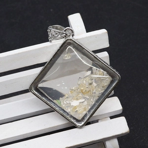Rhombus glass pendant with white crystal chips and silver-plated metal frame