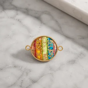 Macro view of colorful emperor stone connector with golden edges for jewelry DIY
