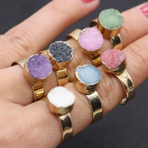 Set of colorful natural druzy quartz rings with round crystals in gold-plated settings