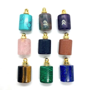 Detail of nine various gemstone perfume bottle pendants including amethyst and tiger eye