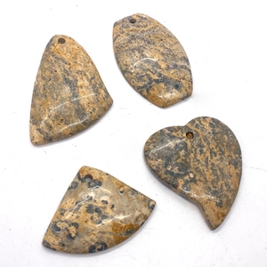 Polished leopard skin agate stone pendants in heart and oval shapes with pre-drilled holes