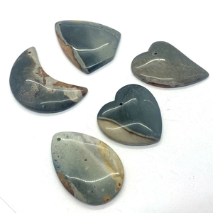 Five pieces of polished natural lime green agate pendants in moon, heart and drop shapes
