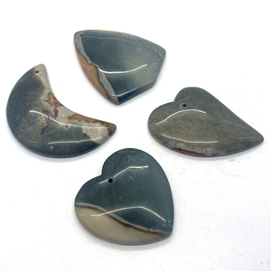 Polished lime green agate pendants in moon and heart shapes with natural stone texture