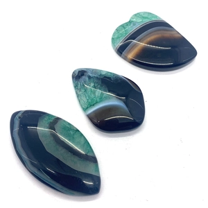 Polished natural striped agate pendants in teardrop and oval shapes for jewelry making