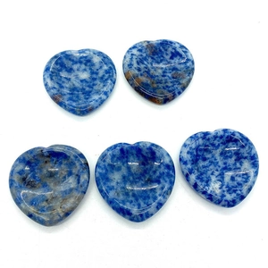 Polished blue natural heart-shaped palm stones with white speckled marble pattern