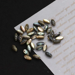 Makroaufnahme von 5x10mm Reisförmige Abalone Muschelperlen mit natürlichem Perlmuttglanz DIY
