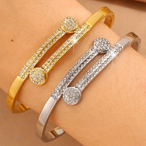Polished titanium steel bangles with sparkling crystals in gold and silver finish