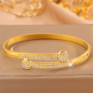 Elegant gold titanium steel open bangle featuring double rows of micro-pave crystals
