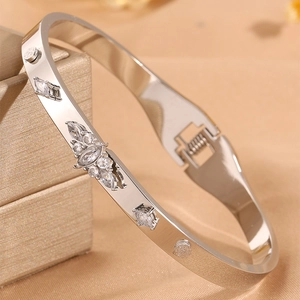 Polished silver stainless steel clover bangle with sparkling marquise and round zircon stones