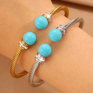 Bracelet jonc torsadé élégant avec perle et pavé de diamants en or et en argent