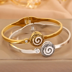 Polished stainless steel bracelets with Greek key pattern and small zircon crystal