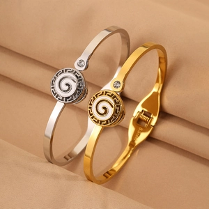 Elegant stainless steel bangles with Greek key pattern and spiral relief design