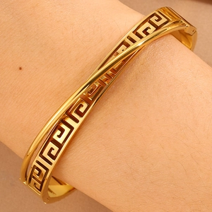 Elegant gold-plated stainless steel cuff bracelet with Greek Greca patterns and double loop design