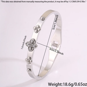 Detailed view of silver stainless steel clover bracelet with zircon inlay and dimensions