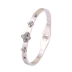 Elegant silver stainless steel open bangle with sparkling clover and floral crystal accents
