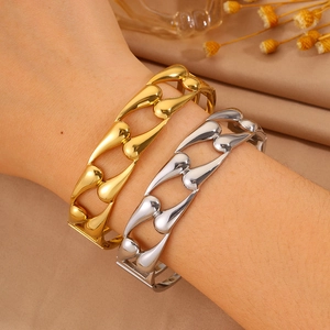 Polished gold and silver stainless steel teardrop hollow bangles for women