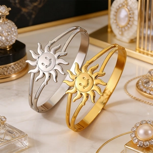 Elegant stainless steel open bangle set with smiling sun motif in gold and silver finish