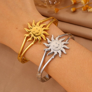 Polished sun-shaped stainless steel bracelets in gold and silver finish for women