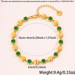 Detail of 18k gold plated stainless steel bracelet with green emerald round gems