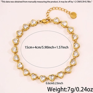 Detailed view of gold plated heart chain bracelet with zircon stones and length markers