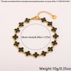 Detail of four-leaf clover bracelet in gold titanium steel with green stone and size specs