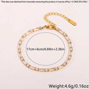 Detailed view of 18K gold plated tennis bracelet featuring square and round cubic zirconia