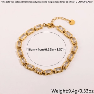 Detail view of gold heart flower bracelet with zircon crystals, lobster clasp, and extension
