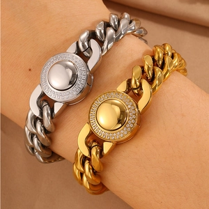 Ensemble de bracelets gourmettes en argent et or avec cadran central serti de diamants