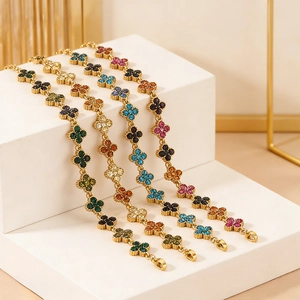 Luxurious gold titanium steel four-leaf clover bracelets with colorful zircon stones