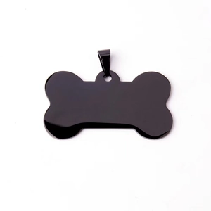 Close-up of a polished bone-shaped black stainless steel pet tag with a mirror finish