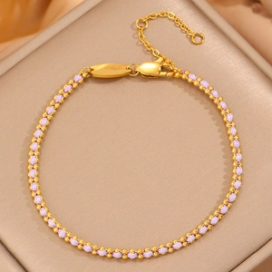 Braided gold beads and purple cord bracelet with adjustable lobster clasp closure