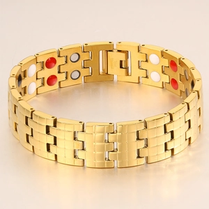 Detail view of gold stainless steel link bracelet with magnetic health elements inside