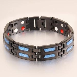 Detail view of men's magnetic steel bracelet with carbon fiber inlay and sturdy clasp