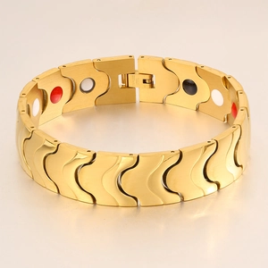 Detail of 18k gold plated magnetic stainless steel therapy bracelet with colorful inserts