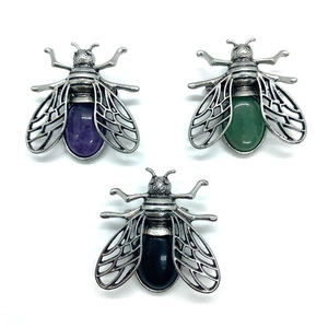 Set of three vintage insect pendants with natural stones in purple green and black onyx
