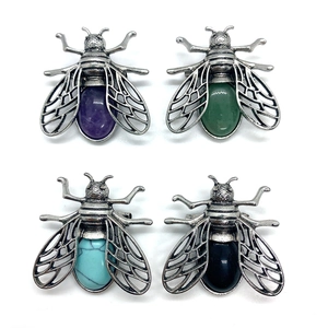 Set of four antique silver bee pendants with assorted colored gemstone oval cabochons