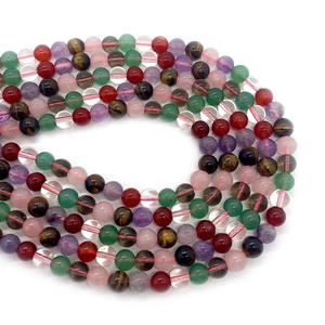 Polished natural tiger eye and amethyst crystal round beads in colorful multi-layer display