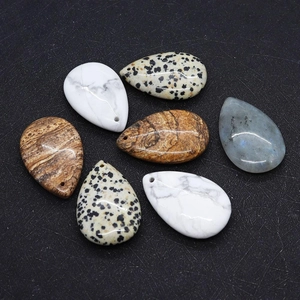 Polished natural teardrop pendants including Labradorite, Dalmatian Jasper and Howlite