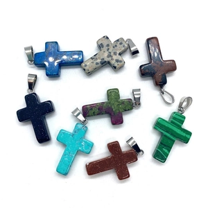Cross-shaped natural stone pendants with silver clasps in diverse gemstone colors