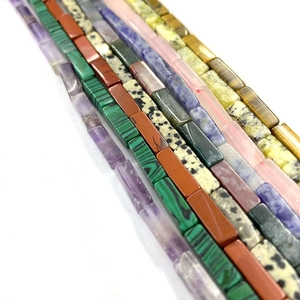 Natural rectangular tube gemstone beads in various colors including tiger eye and lapis lazuli