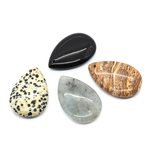 Polished natural teardrop stones including dalmatian jasper and labradorite with top holes