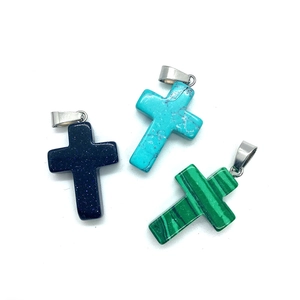 Natural stone cross pendants in blue sandstone, turquoise, and malachite with metal bails