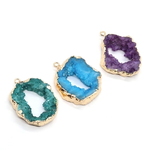 Natural crystal stone pendants in green blue and purple with gold metallic edges