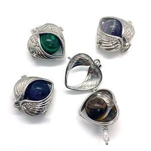 Heart-shaped hollow cage pendant with interchangeable natural stone beads in four colors