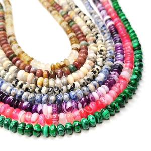 Colorful flat round gemstone beads for DIY necklaces featuring agate and malachite textures